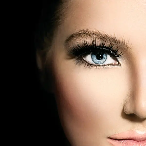 Close-up of premium eyelash extensions showcasing long, voluminous lashes and flawless eye makeup at Sangkent Beauty House.